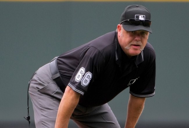 DENVER - AUGUST 23:  Second base umpire Jim Joyce oversees the action between the Colorado Rockies and the San Francisco Giants at Coors Field on August 23, 2009 in Denver, Colorado. The Rockies defeated the Giants 4-2.  (Photo by Doug Pensinger/Getty Images)