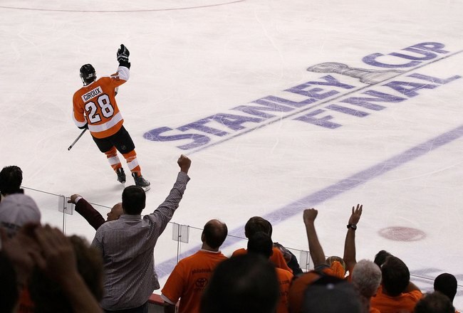PHILADELPHIA - JUNE 02:  Claude Giroux #28 of the Philadelphia Flyers celebrates after scoring the game-winning goal in overtime to defeat the Chicago Blackhawks 4-3 in Game Three of the 2010 NHL Stanley Cup Final at Wachovia Center on June 2, 2010 in Philadelphia, Pennsylvania.  (Photo by Jim McIsaac/Getty Images)