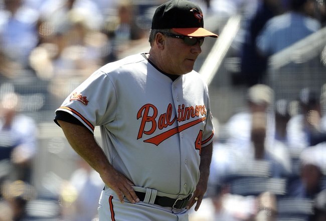 NEW YORK - MAY 05:  Manager Dave Trembley #47 of the Baltimore Orioles walks back to the dugout against the New York Yankees at Yankee Stadium on May 5, 2010 in the Bronx borough of New York City  (Photo by Jeff Zelevansky/Getty Images)