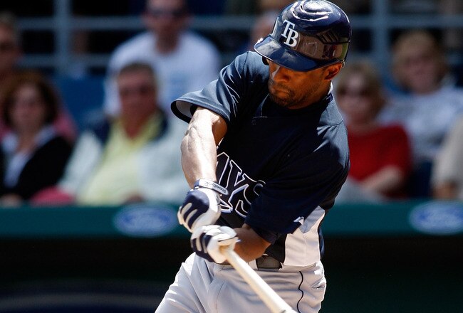 FORT MYERS, FL - MARCH 08:  Outfielder Fernando Perez #38 of the Tampa Bay Rays fouls off a pitch against the Boston Red Sox during a Grapefruit League Spring Training Game at City of Palms Park on March 8, 2009 in Fort Myers, Florida.  (Photo by J. Meric/Getty Images)