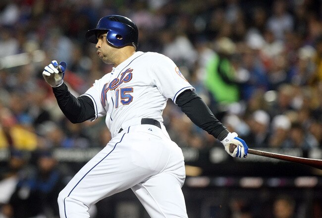 NEW YORK - JUNE 11: Carlos Beltran #15 of the New York Mets hits an RBI double in the third inning against the Philadelphia Phillies on June 11, 2009 at Citi Field in the Flushing neighborhood of the Queens borough of New York City. (Photo by Nick Laham/Getty Images)