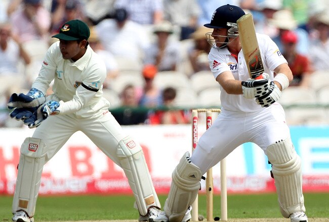MANCHESTER, ENGLAND - JUNE 04:  Mushfiqur Rahim of Bangladesh looks on as Ian Bell scores runs during the first day of the 2nd npower Test between England and Bangladesh at Old Trafford on June 4, 2010 in Manchester, England.  (Photo by Julian Herbert/Getty Images)