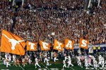 PASADENA, CA - JANUARY 07:  The Texas Longhorns run out onto the field prior to the Citi BCS National Championship game between the Texas Longhorns and the Alabama Crimson Tide at the Rose Bowl on January 7, 2010 in Pasadena, California.  (Photo by Jeff Gross/Getty Images)