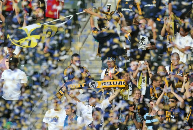 CARSON, CA - JUNE 5:   Los Angeles Galaxy fans celebrate as the game ends with the Houston Dynamo on June 5, 2010 at the Home Depot Center in Carson, California. The Galaxy won 4-1.  (Photo by Stephen Dunn/Getty Images)