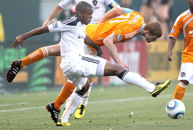 CARSON, CA - JUNE 05:  Tristan Bowen #17 of the Los Angeles Galaxy battles for the ball with Andrew Hainault #31 of the Houston Dynamo on June 5, 2010 at the Home Depot Center in Carson, California. The Galaxy won 4-1.  (Photo by Stephen Dunn/Getty Images)