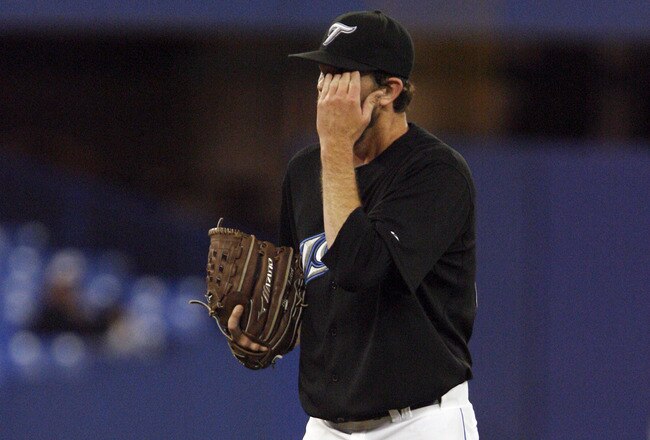 TORONTO - APRIL 17: Brian Tallet #56 of the Toronto Blue Jays reacts to a two-run home run against the Los Angeles Angels during a MLB game at the Rogers Centre April 17, 2010 in Toronto, Ontario, Canada. (Photo by Abelimages / Getty Images)