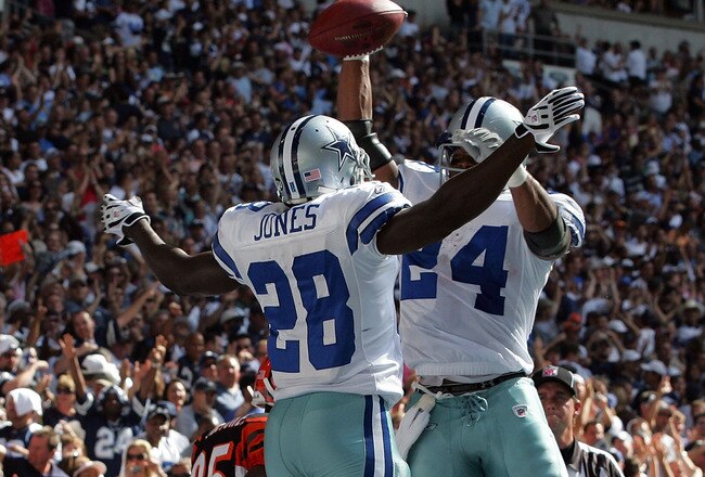 IRVING, TX - OCTOBER 05:  Running back Felix Jones #28 of the Dallas Cowboys celebrates a touchdown with Marion Barber #24 against the Cincinnati Bengals at Texas Stadium on October 5, 2008 in Irving, Texas.  (Photo by Ronald Martinez/Getty Images)