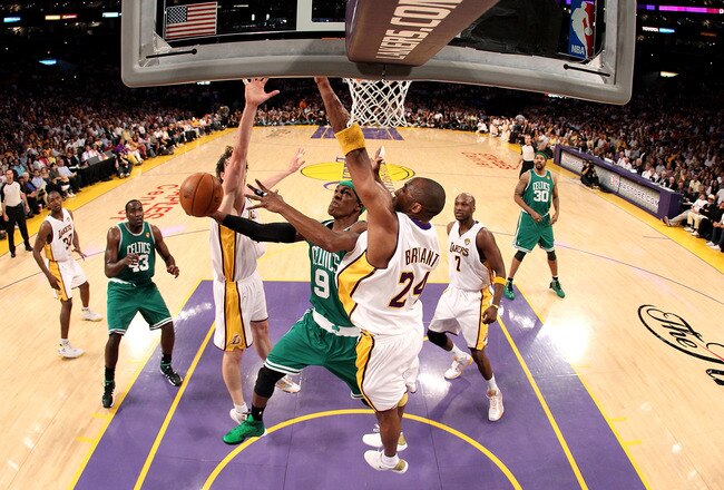 LOS ANGELES, CA - JUNE 06:  Rajon Rondo #9 of the Boston Celtics goes to the basket against Pau Gasol #16 and Kobe Bryant #24 of the Los Angeles Lakers in Game Two of the 2010 NBA Finals at Staples Center on June 6, 2010 in Los Angeles, California. NOTE TO USER: User expressly acknowledges and agrees that, by downloading and/or using this Photograph, user is consenting to the terms and conditions of the Getty Images License Agreement  (Photo by Christian Petersen/Getty Images)