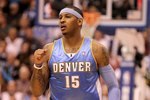 SALT LAKE CITY - APRIL 30:  Carmelo Anthony #15 of the Denver Nuggets pumps his fist during their game against the Utah Jazz in Game Six of the Western Conference Quarterfinals of the 2010 NBA Playoffs at EnergySolutions Arena on April 30, 2010 in Salt Lake City, Utah. NOTE TO USER: User expressly acknowledges and agrees that, by downloading and or using this photograph, User is consenting to the terms and conditions of the Getty Images License Agreement.  (Photo by Ezra Shaw/Getty Images)