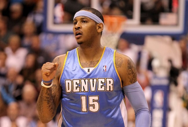 SALT LAKE CITY - APRIL 30:  Carmelo Anthony #15 of the Denver Nuggets pumps his fist during their game against the Utah Jazz in Game Six of the Western Conference Quarterfinals of the 2010 NBA Playoffs at EnergySolutions Arena on April 30, 2010 in Salt Lake City, Utah. NOTE TO USER: User expressly acknowledges and agrees that, by downloading and or using this photograph, User is consenting to the terms and conditions of the Getty Images License Agreement.  (Photo by Ezra Shaw/Getty Images)