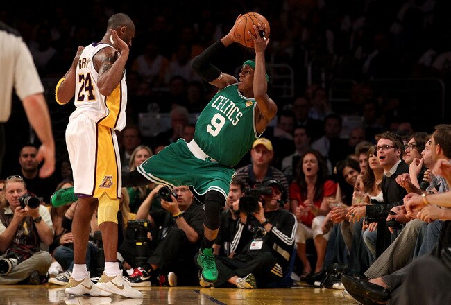 LOS ANGELES, CA - JUNE 06:  Rajon Rondo #9 of the Boston Celtics tries to save the ball from going out of bounds while under pressure from Kobe Bryant #24 of the Los Angeles Lakers in Game Two of the 2010 NBA Finals at Staples Center on June 6, 2010 in Los Angeles, California. NOTE TO USER: User expressly acknowledges and agrees that, by downloading and/or using this Photograph, user is consenting to the terms and conditions of the Getty Images License Agreement  (Photo by Christian Petersen/Getty Images)