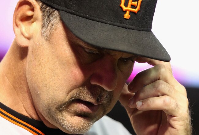 PHOENIX - MAY 20:  Manager Bruce Bochy of the San Francisco Giants walks off the field after being thrown out of the Major League Baseball game against the Arizona Diamondbacks at Chase Field on May 20, 2010 in Phoenix, Arizona. The Diamondbacks defeated the Giants 8-7.  (Photo by Christian Petersen/Getty Images)