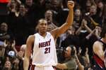 MIAMI - APRIL 25:  Jamaal Magloire #21 of the Miami Heat celebrates after the Heat take a 21 point lead at half-time against the Atlanta Hawks during Game Three of the Eastern Conference Quarterfinals at American Airlines Arena on April 25, 2009 in Miami, Florida. NOTE TO USER: User expressly acknowledges and agrees that, by downloading and/or using this Photograph, user is consenting to the terms and conditions of the Getty Images License Agreement.  (Photo by Doug Benc/Getty Images)