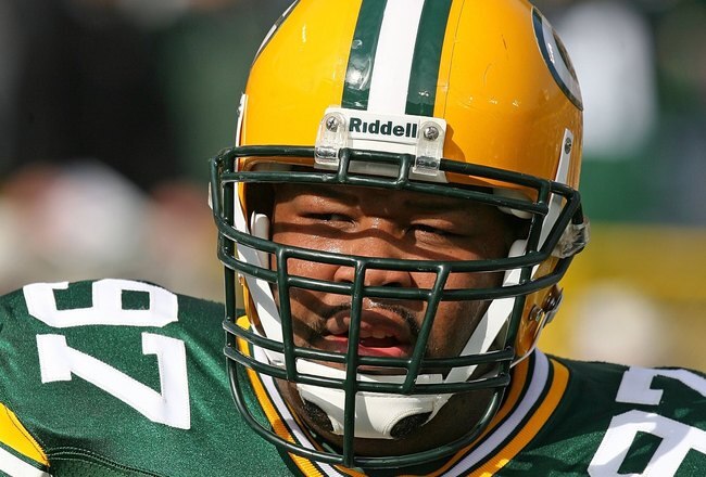 GREEN BAY, WI - OCTOBER 18: Johnny Jolly #97 of the Green Bay Packers participates in warm-ups before a game against the Detroit Lions at Lambeau Field on October 18, 2009 in Green Bay, Wisconsin. The Packers defeated the Lions 26-0. (Photo by Jonathan Daniel/Getty Images)