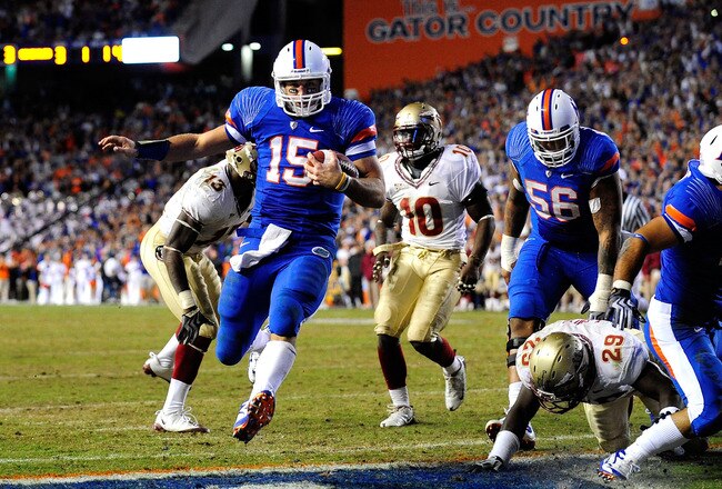 GAINESVILLE, FL - NOVEMBER 28:  Tim Tebow #15 of the Florida Gators runs for a touchdown during the game against the Florida State Seminoles at Ben Hill Griffin Stadium on November 28, 2009 in Gainesville, Florida.  (Photo by Sam Greenwood/Getty Images)