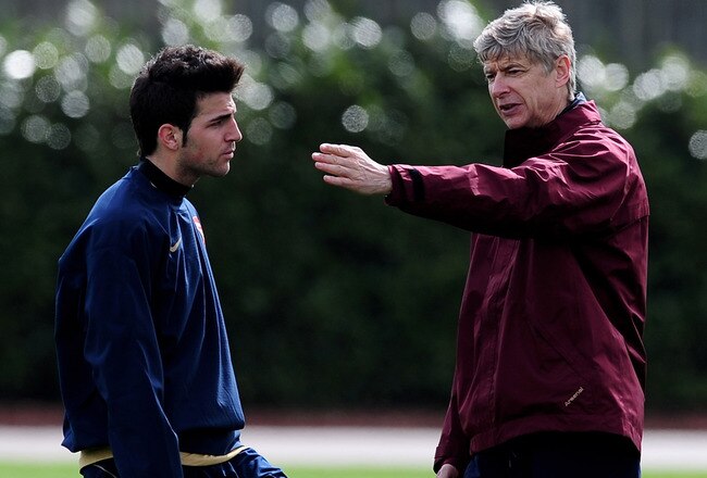 LONDON - APRIL 01:  Arsene Wenger the Arsenal coach talks with Cesc Fabregas during an Arsenal training session at Arsenal's London Colney Training Ground on April 1, 2008 in London, England.  (Photo by Shaun Botterill/Getty Images)