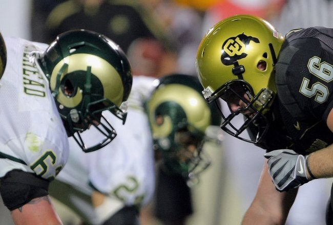 BOULDER, CO - SEPTEMBER 06:  Center Keenan Stevens #56 of the Colorado Buffaloes prepares to snap the ball on the line of scrimmage against the Colorado State Rams at Folsom Field on September 6, 2009 in Boulder, Colorado. The Rams defeated the Buffaloes 23-17.  (Photo by Doug Pensinger/Getty Images)