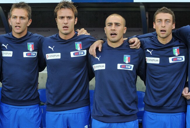GENEVA, SWITZERLAND - JUNE 05:  Domenico Criscito, Alberto Gilardino, Fabio Cannavaro and Claudio Marchisio of Italy sing Italian anthem during the international friendly match between Switzerland and Italy at Stade de Geneve ahead of the FIFA World Cup 2010 in South Africa on June 5, 2010 in Geneva, Switzerland.  (Photo by Massimo Cebrelli/Getty Images)