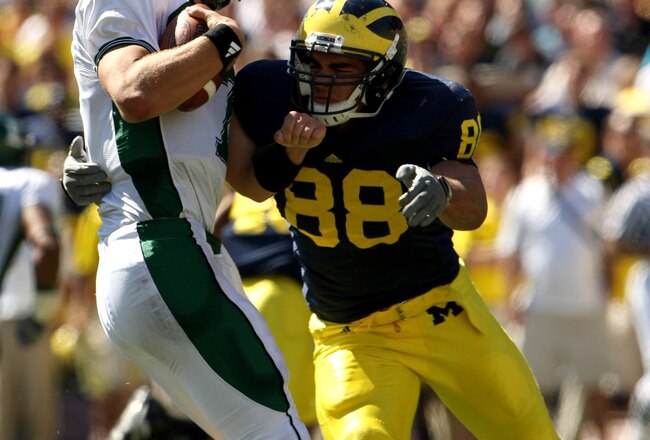 ANN ARBOR, MI - SEPTEMBER 19: Linebacker Craig Roh #88 of the Michigan Wolverines sacks quarterback Andy Schmitt #7 of the Eastern Michigan Eagles at Michigan Stadium on September 19, 2009 in Ann Arbor, Michigan.  Michigan won 45-17.  (Photo by Stephen Dunn/Getty Images)