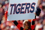 AUBURN, AL - NOVEMBER 27:  A cheerleader for the Auburn Tigers peforms before the game against the Alabama Crimson Tide at Jordan-Hare Stadium on November 27, 2009 in Auburn, Alabama.  (Photo by Kevin C. Cox/Getty Images)