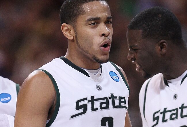 ST. LOUIS - MARCH 26:  Chris Allen #3 and Draymond Green #23 of the Michigan State Spartans celebrate in the second half against the Northern Iowa Panthers during the midwest regional semifinal of the 2010 NCAA men's basketball tournament at the Edward Jones Dome on March 26, 2010 in St. Louis, Missouri. Michigan State defeated Northern Iowa 59-52.  (Photo by Elsa/Getty Images)