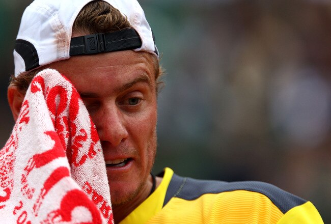 PARIS - MAY 29:  Lleyton Hewitt of Australia reacts during the men's singles third round match between Rafael Nadal of Spain and Lleyton Hewitt of Australia on day seven of the French Open at Roland Garros on May 29, 2010 in Paris, France.  (Photo by Clive Brunskill/Getty Images)
