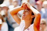 PARIS - JUNE 05:  Francesca Schiavone of Italy celebrates winning championship point during women's singles final match between Francesca Schiavone of Italy and Samantha Stosur of Australia on day fourteen of the French Open at Roland Garros on June 5, 2010 in Paris, France.  (Photo by Matthew Stockman/Getty Images)