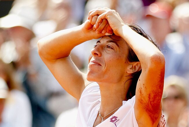 PARIS - JUNE 05:  Francesca Schiavone of Italy celebrates winning championship point during women's singles final match between Francesca Schiavone of Italy and Samantha Stosur of Australia on day fourteen of the French Open at Roland Garros on June 5, 2010 in Paris, France.  (Photo by Matthew Stockman/Getty Images)