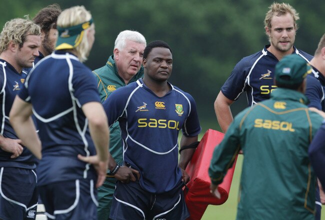 CARDIFF, WALES - JUNE 01:  Springboks Chiliboy Ralepelle (C) listens with his team mates at a training session at the University of Glamorgan playing fields on June 1, 2010 in Cardiff, Wales.  (Photo by Matt Cardy/Getty Images)