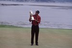 18 Jun 2000:  Tiger Woods of the USA poses with the winning trophy after winning the 100th US Open held at the Pebble Beach Golf Links, in Pebble Beach, California. \ Mandatory Credit: David Cannon /Allsport