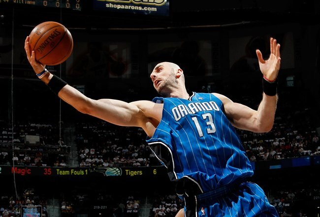 ATLANTA - MAY 08:  Marcin Gortat #13 of the Orlando Magic against the Atlanta Hawks during Game Three of the Eastern Conference Semifinals during the 2010 NBA Playoffs at Philips Arena on May 8, 2010 in Atlanta, Georgia.  NOTE TO USER: User expressly acknowledges and agrees that, by downloading and/or using this Photograph, User is consenting to the terms and conditions of the Getty Images License Agreement.  (Photo by Kevin C. Cox/Getty Images)