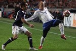 AMSTERDAM, NETHERLANDS - MARCH 03:  Jonathan Bornstein of USA tries to tackle Arjen Robben of the Netherland during the International Friendly between Netherlands and USA at the Amsterdam Arena on March 3, 2010 in Amsterdam, Netherlands.  (Photo by Ian Walton/Getty Images)