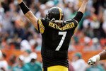 MIAMI - JANUARY 03:  Quarterback Ben Roethlisberger #7 of the Pittsburgh Steelers celebrates after throwing a touchdown pass to wide receiver Mike Wallace #17 in the second quarter against the Miami Dolphins at Land Shark Stadium on January 3, 2010 in Miami, Florida.  (Photo by Doug Benc/Getty Images)