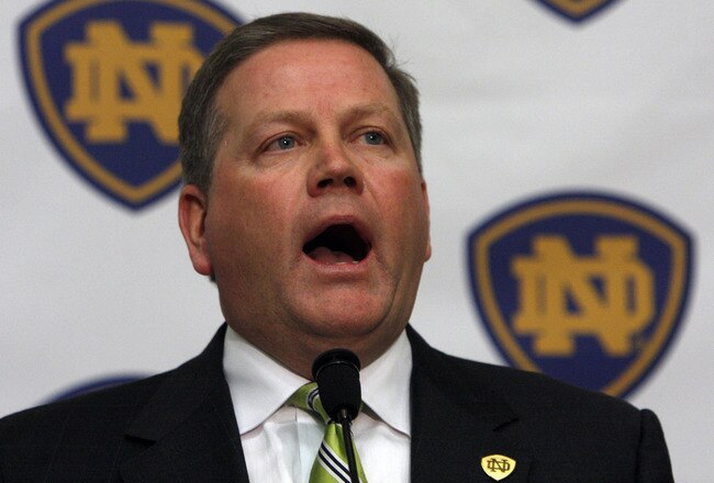 SOUTH BEND, IN - DECEMBER 11: Brian Kelly attends a press conference where he was named new football head coach at Notre Dame University on December 11, 2009 in South Bend, Indiana.  Kelly most recently led the University of Cincinnati to two consecutive Bowl Championship Series appearances including a perfect 12-0 record this past season. (Photo by Frank Polich/Getty Images)