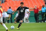 WASHINGTON - MAY 29: Chris Pontius #13 of D.C. United passes the ball against Chivas USA at RFK Stadium on May 29, 2010 in Washington, DC. D.C. United won 3-2. (Photo by Ned Dishman/Getty Images)