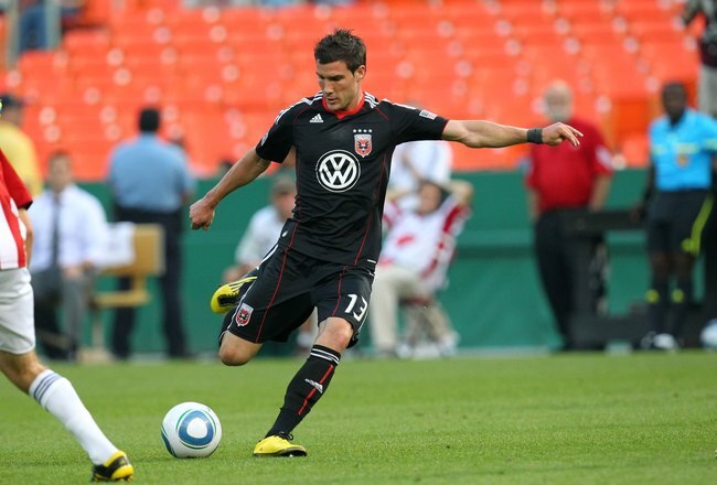WASHINGTON - MAY 29: Chris Pontius #13 of D.C. United passes the ball against Chivas USA at RFK Stadium on May 29, 2010 in Washington, DC. D.C. United won 3-2. (Photo by Ned Dishman/Getty Images)
