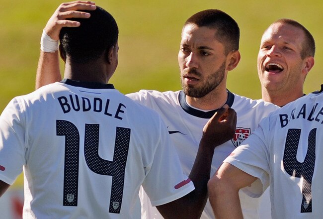 ROODEPOORT, SOUTH AFRICA - JUNE 05:  Edson Buddle #14 of USA is congratulated by Clint Dempsey #8 and Jay DeMerit (R) after scoring a goal against Australia during first half of the 2010 FIFA World Cup Pre-Tournament match between the Australian Socceroos and the United States of America at Ruimsig Stadium on June 5, 2010 in Roodepoort, South Africa. USA won, 3-1.  (Photo by Kevork Djansezian/Getty Images)