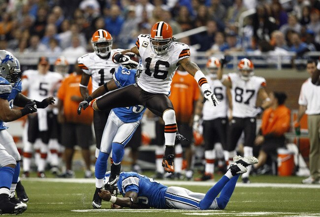 DETROIT, MI - NOVEMBER 22: Josh Cribbs #16 of the Cleveland Browns jumps over a defender while running with the football against the Detroit Lions at Ford Field on November 22, 2009 in Detroit, Michigan. The Lions came from behind to defeat the Browns 38-37. (Photo by Joe Robbins/Getty Images)