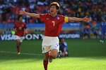 PORT ELIZABETH, SOUTH AFRICA - JUNE 12:  Park Ji-Sung of South Korea celebrates scoring the second goal during the 2010 FIFA World Cup South Africa Group B match between South Korea and Greece at Nelson Mandela Bay Stadium on June 12, 2010 in Port Elizabeth, South Africa.  (Photo by Jamie McDonald/Getty Images)