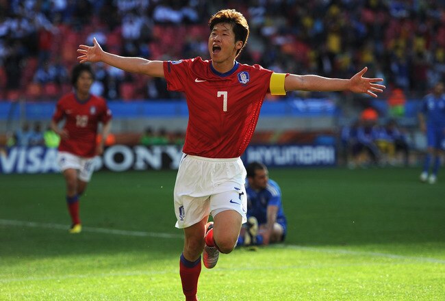 PORT ELIZABETH, SOUTH AFRICA - JUNE 12:  Park Ji-Sung of South Korea celebrates scoring the second goal during the 2010 FIFA World Cup South Africa Group B match between South Korea and Greece at Nelson Mandela Bay Stadium on June 12, 2010 in Port Elizabeth, South Africa.  (Photo by Jamie McDonald/Getty Images)
