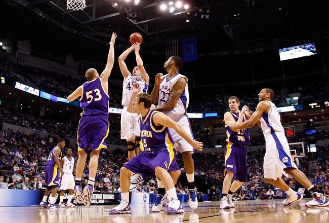 OKLAHOMA CITY - MARCH 20:  Cole Aldrich #45 of the Kansas Jayhawks attempts a shot against Jordan Eglseder #53 of the Northern Iowa Panthers during the second round of the 2010 NCAA men's basketball tournament at Ford Center on March 20, 2010 in Oklahoma City, Oklahoma.  (Photo by Ronald Martinez/Getty Images)