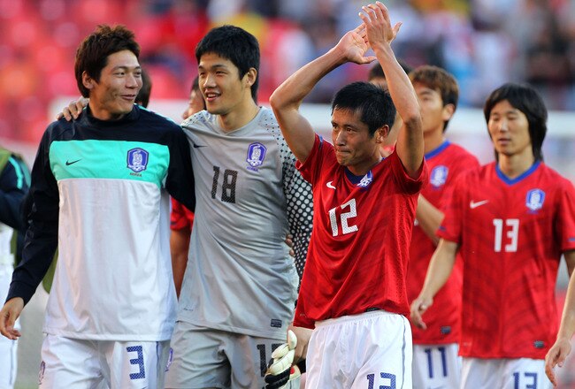 PORT ELIZABETH, SOUTH AFRICA - JUNE 12:  Lee Young-Pyo of South Korea applauds the fans after the 2010 FIFA World Cup South Africa Group B match between South Korea and Greece at Nelson Mandela Bay Stadium on June 12, 2010 in Port Elizabeth, South Africa.  (Photo by Doug Pensinger/Getty Images)