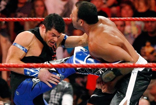 LAS VEGAS - AUGUST 24:  Wrestlers Evan Bourne (L) kicks Chavo Guerrero during the WWE Monday Night Raw show at the Thomas & Mack Center August 24, 2009 in Las Vegas, Nevada.  (Photo by Ethan Miller/Getty Images)