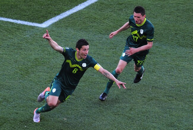 POLOKWANE, SOUTH AFRICA - JUNE 13:  Robert Koren of Slovenia (L) celebrates with teammate Andraz Kirm after scoring the first goal during the 2010 FIFA World Cup South Africa Group C match between Algeria and Slovenia at the Peter Mokaba Stadium on June 13, 2010 in Polokwane, South Africa.  (Photo by Clive Mason/Getty Images)