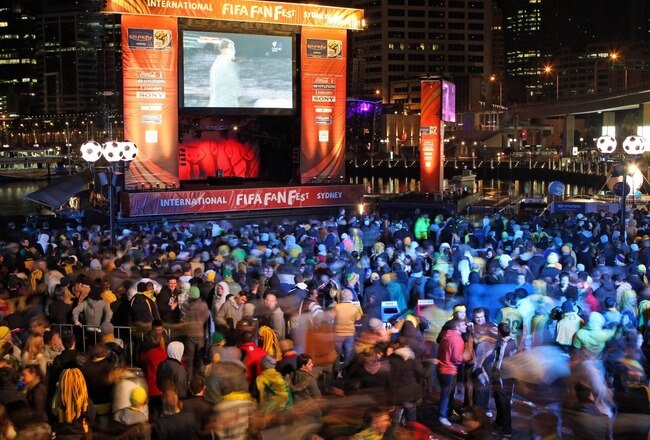 SYDNEY, AUSTRALIA - JUNE 14:  In this handout photo provided by Rick Stevens, football fans gather to watch the 2010 World Cup Group D match between Australia and Germany at the Sydney International FIFA Fan Fest site on June 14, 2010 in Sydney, Australia.  (Photo by Rick Stevens/FIFA Fan Fest via Getty Images)
