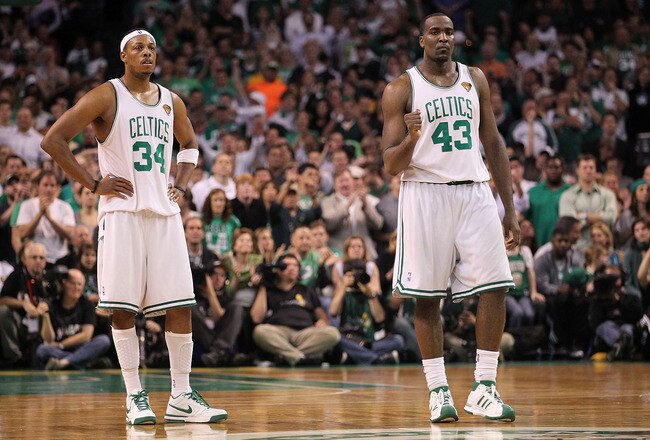 BOSTON - JUNE 13:  (L-R) Paul Pierce #34 and Kendrick Perkins #43 of the Boston Celtics look on against the Los Angeles Lakers during Game Five of the 2010 NBA Finals on June 13, 2010 at TD Garden in Boston, Massachusetts. NOTE TO USER: User expressly acknowledges and agrees that, by downloading and/or using this Photograph, user is consenting to the terms and conditions of the Getty Images License Agreement.  (Photo by Ronald Martinez/Getty Images)