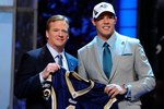 NEW YORK - APRIL 22:  Quarterback Sam Bradford (R) from the Oklahoma Sooners poses with NFL Commissioner Roger Goodell as they hold up a St. Louis Rams jersey after the Rams selected Bradford numer 1 overall during the first round of the 2010 NFL Draft at Radio City Music Hall on April 22, 2010 in New York City.  (Photo by Jeff Zelevansky/Getty Images)
