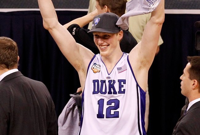 INDIANAPOLIS - APRIL 05:  Kyle Singler #12 of the Duke Blue Devils celebrates after Duke won 61-59 against the Butler Bulldogs during the 2010 NCAA Division I Men's Basketball National Championship game at Lucas Oil Stadium on April 5, 2010 in Indianapolis, Indiana.  (Photo by Kevin C. Cox/Getty Images)