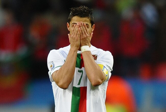 PORT ELIZABETH, SOUTH AFRICA - JUNE 15:  Cristiano Ronaldo of Portugal looks frustrated during the 2010 FIFA World Cup South Africa Group G match between Ivory Coast and Portugal at Nelson Mandela Bay Stadium on June 15, 2010 in Port Elizabeth, South Africa.  (Photo by Laurence Griffiths/Getty Images)