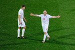 RUSTENBURG, SOUTH AFRICA - JUNE 12:  Wayne Rooney of England gestures to the referee as Steven Gerrard looks on during the 2010 FIFA World Cup South Africa Group C match between England and USA at the Royal Bafokeng Stadium on June 12, 2010 in Rustenburg, South Africa.  (Photo by Stuart Franklin/Getty Images)